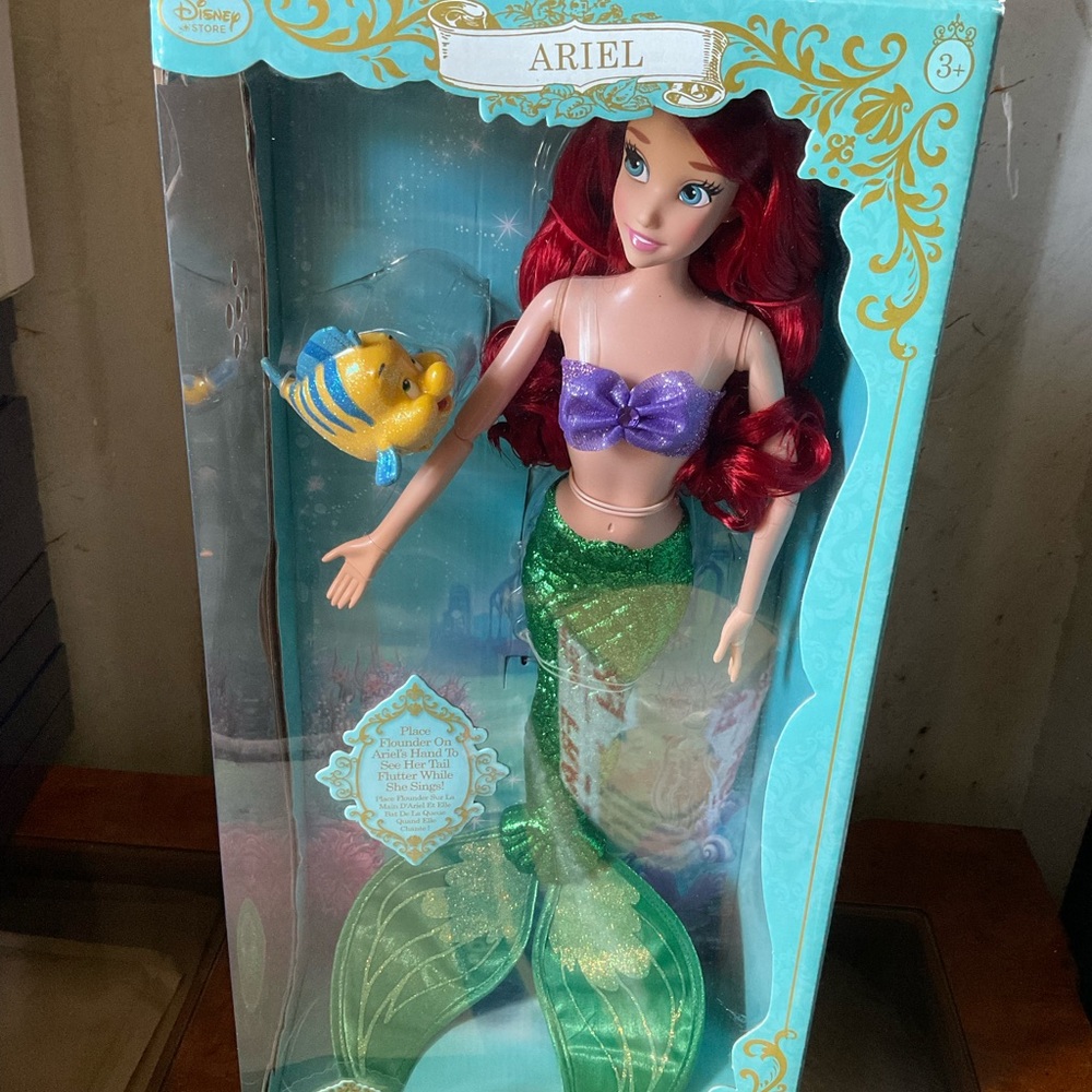 Disney 18 in singing ARIEL doll   . Perfect condition RETIRED